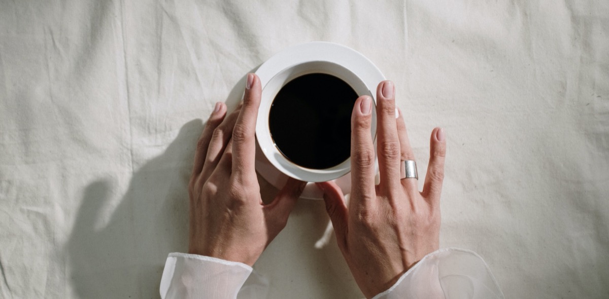 Drinking a cup of coffee. Image: Pexels - cottonbro