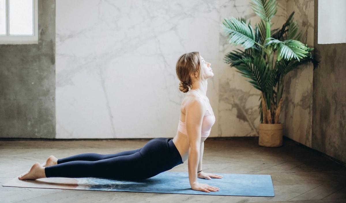 Woman doing yoga. Image: Pexels - Elina Fairytale